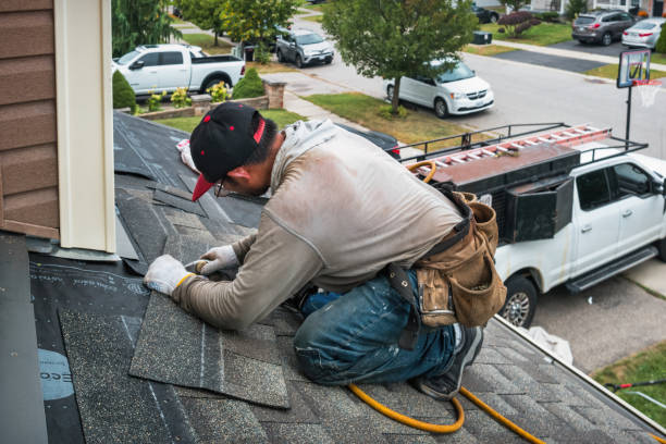 Professional Roofing technician working in Lineville, IA
